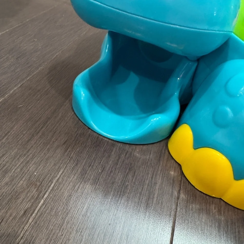 Fisher-Price Go Baby Go! Poppity Pop Musical Colorful Dinosaur Ball Toy Toddler
